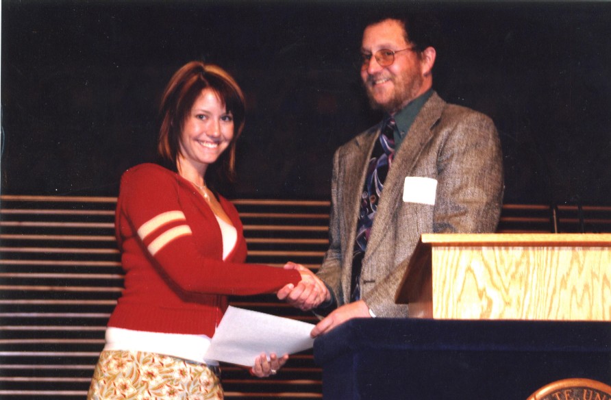 Jessica receiving a scholarship 
from the Utah State University
College of Natural Resources' 
Interim Dean Chris Leucke, May 5, 2005.